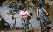 Life in Melbourne - 2 students cycle along Yarra River, Melbourne Life in Melbourne - 2 students cycle along Yarra River, Melbourne