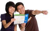 A Victoria University international student provides helpful directions to a new arrival
