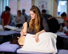 Osteopathy student in clinic with patient