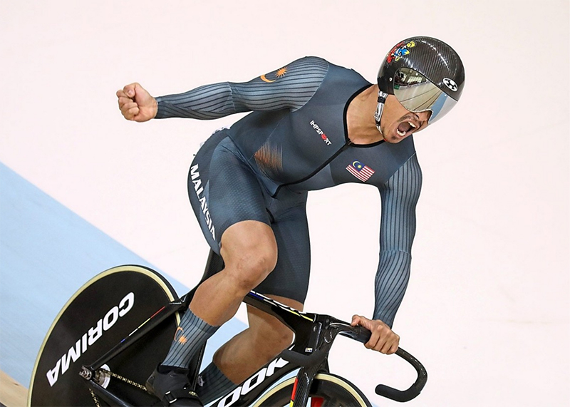 Azizul Awang celebrating a track cycling success.