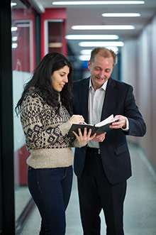 Lecturer and student discussing work