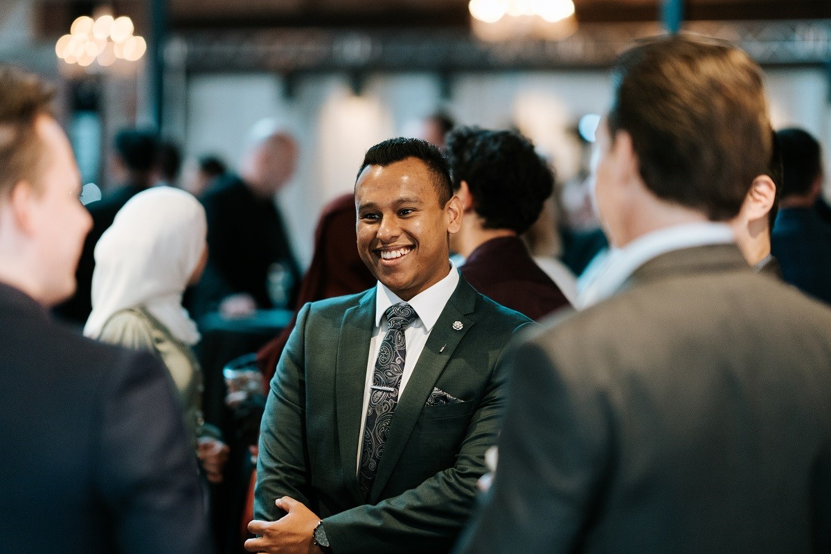  students mingling at the 2022 student leadership awards