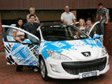 Marketing staff with the Peugeot 308 wagon