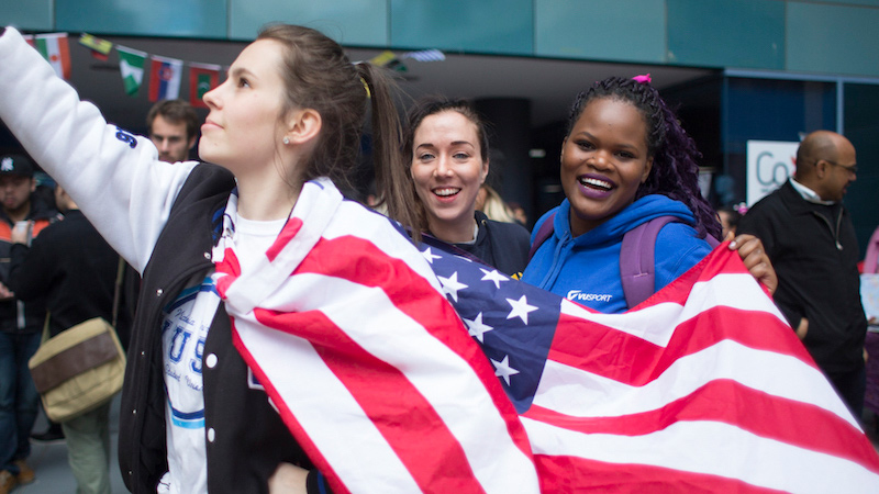 Students with a USA flag.