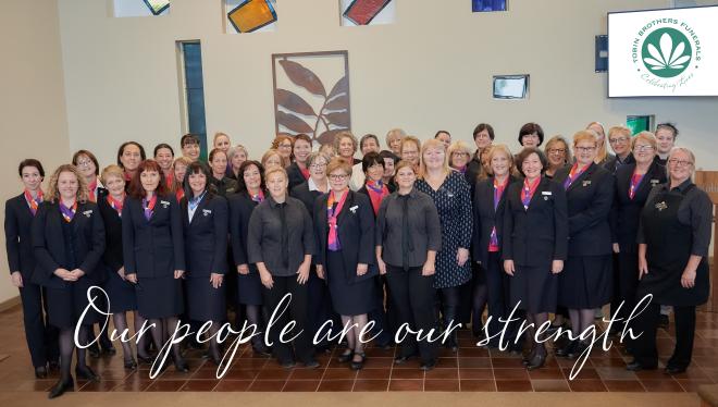 Text on group shot image reads "Our people are our strength"