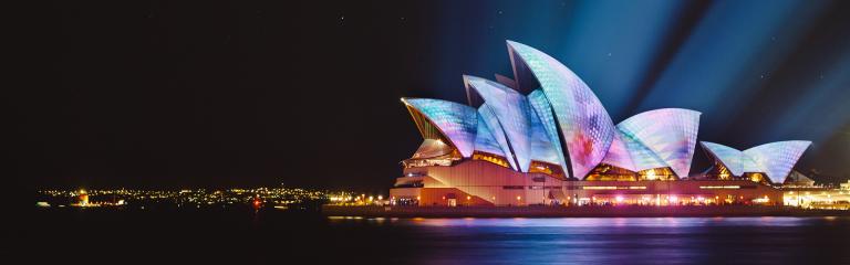 Sydney Opera House (at night); photo by Ethan Ou