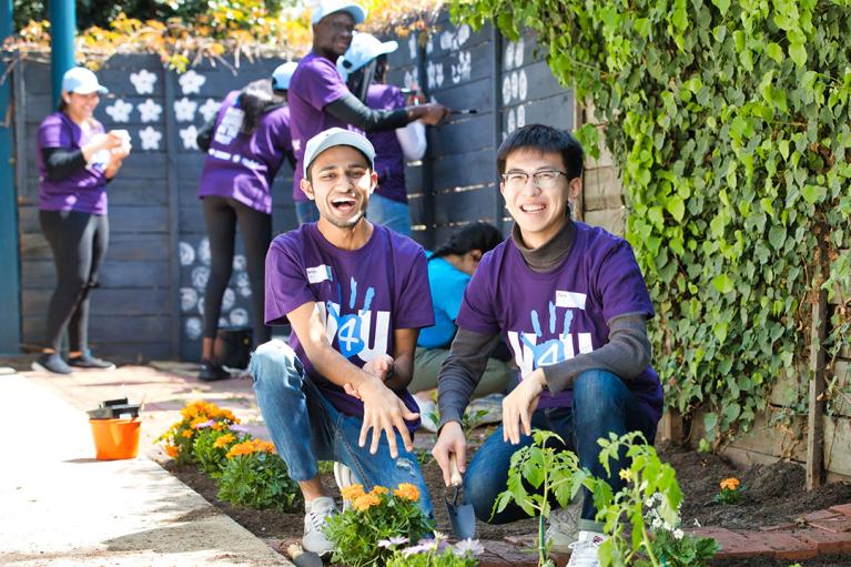  VU students planting a garden at an aged-care facility for V4U Day