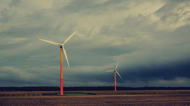 Windmills against a stormy sky