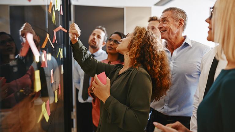 People participate in a brainstorming session.