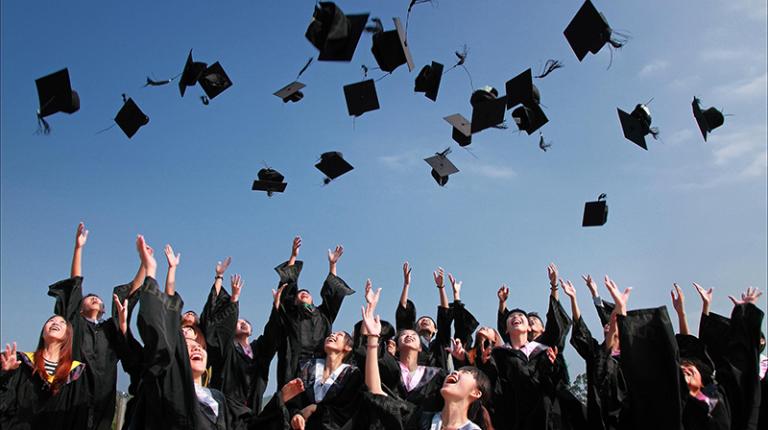 Mortar board hats thrown in air by graduates, image from Pixabay