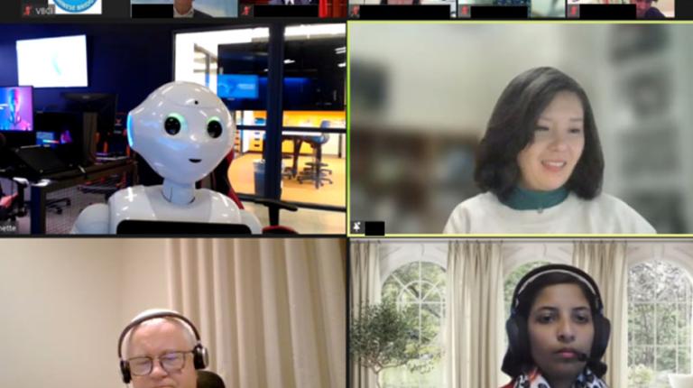 Four student representatives and a robot formed a welcoming team to showcase their learning at VBCI for all the audience. 21st Chinese Bridge Chinese Language Competition students interacting with Robot Pepper.