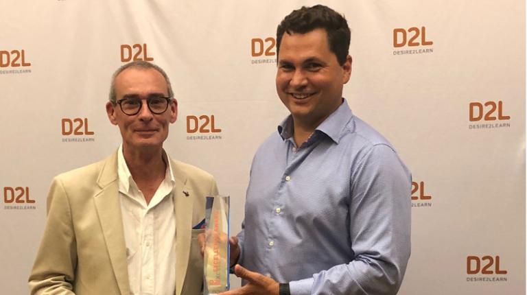 VU Associate Director, Digital Learning Environments, Michael Sturmey with D2L CEO John Baker