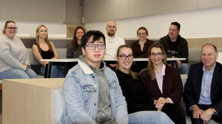 Dr Colin Drake (far right) with students: Top: Lauren McCann, Laura Ryall, Natalie Serovski, Brad Schulz, Emily Attard, Nathan Johnston. Bottom: Cong Dat Hoang, Jasmin Rifat, Adriana Gordillo Ossa Students in classroom with teacher