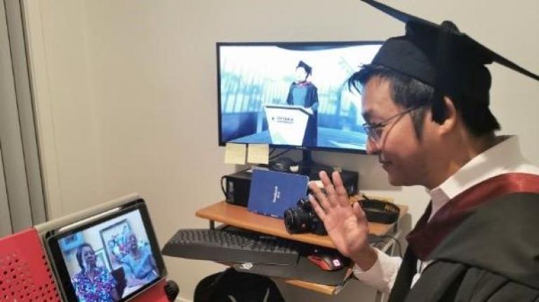 Kit Chaipanukiat during his 'virtual ceremony' as overseas family watch (Photo courtesy Star Weekly) VU graduate Kit Chaipanukiat
