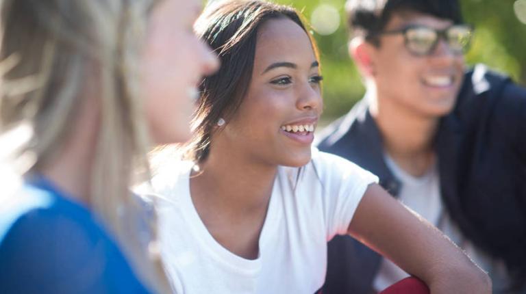 Three students from three different backgrounds