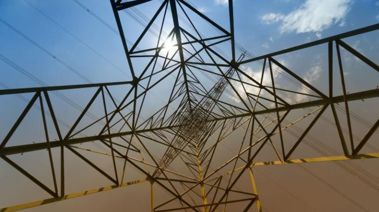 High tension power pole from below