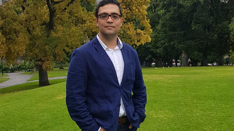 Dr Soheil Bajelan has invented an ankle exoskeleton that generates its own power. Dr Soheil Bajelan standing in a park