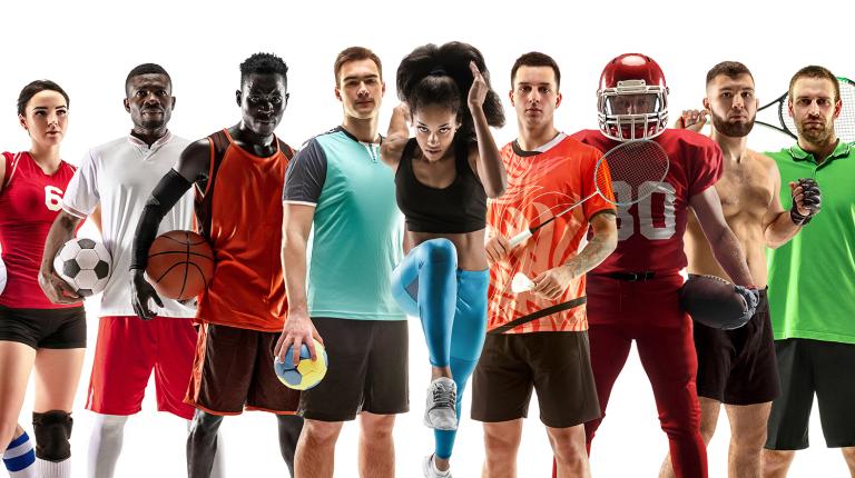 athletes represengting diferent sports standing powerfully together