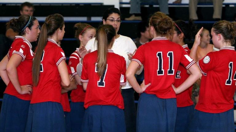 Girls volleyball team with coach