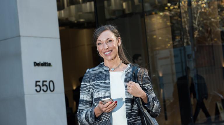 Jessica Pond outside her office at Deloitte
