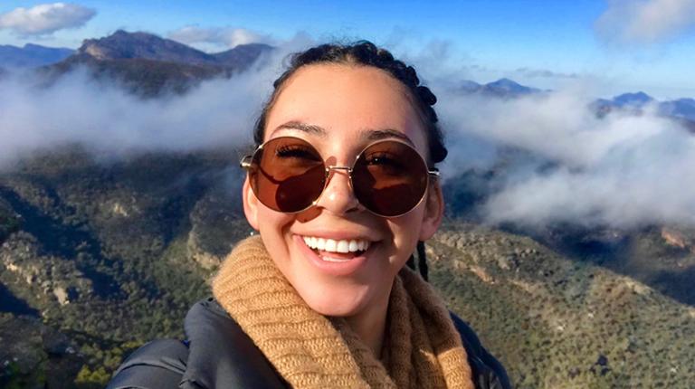 Simone Oram, VUI blogger selfie by mountains