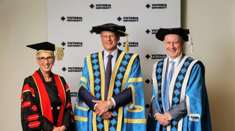 L-R: Her Excellency, The Hon Linda Dessau AC, Governor of Victoria; The Hon Dr Steve Bracks AC; Victoria University Vice-Chancellor, Professor Adam Shoemaker Linda Dessau, Steve Bracks and Adam Shoemaker in gowns and hats.