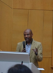 Christo Odeyemi addresses a conference