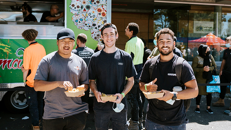   Students next to food truck at Sunshine O-Fest